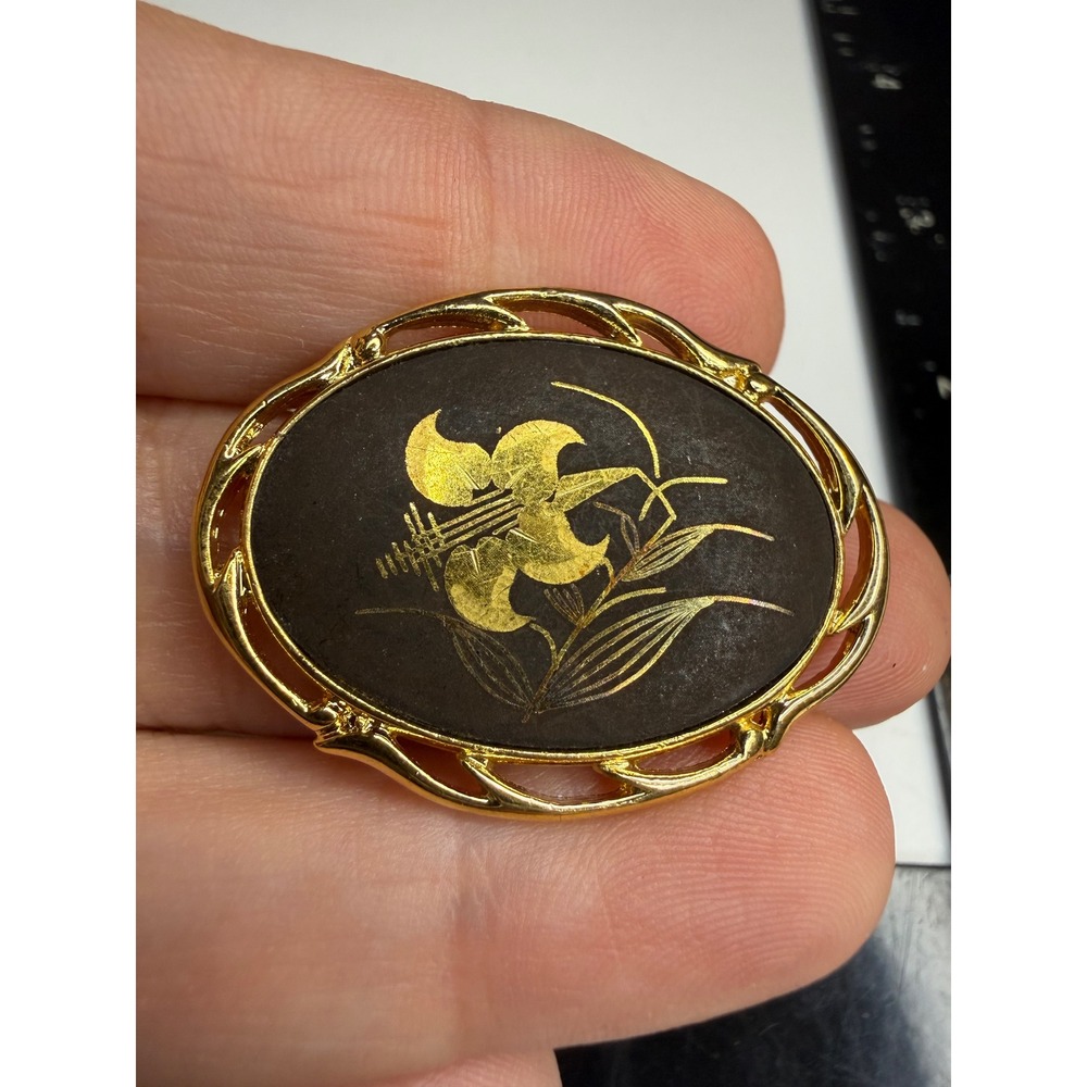Vintage Damascene Style Gold Tone Black Oval Lily Flower Brooch Pin